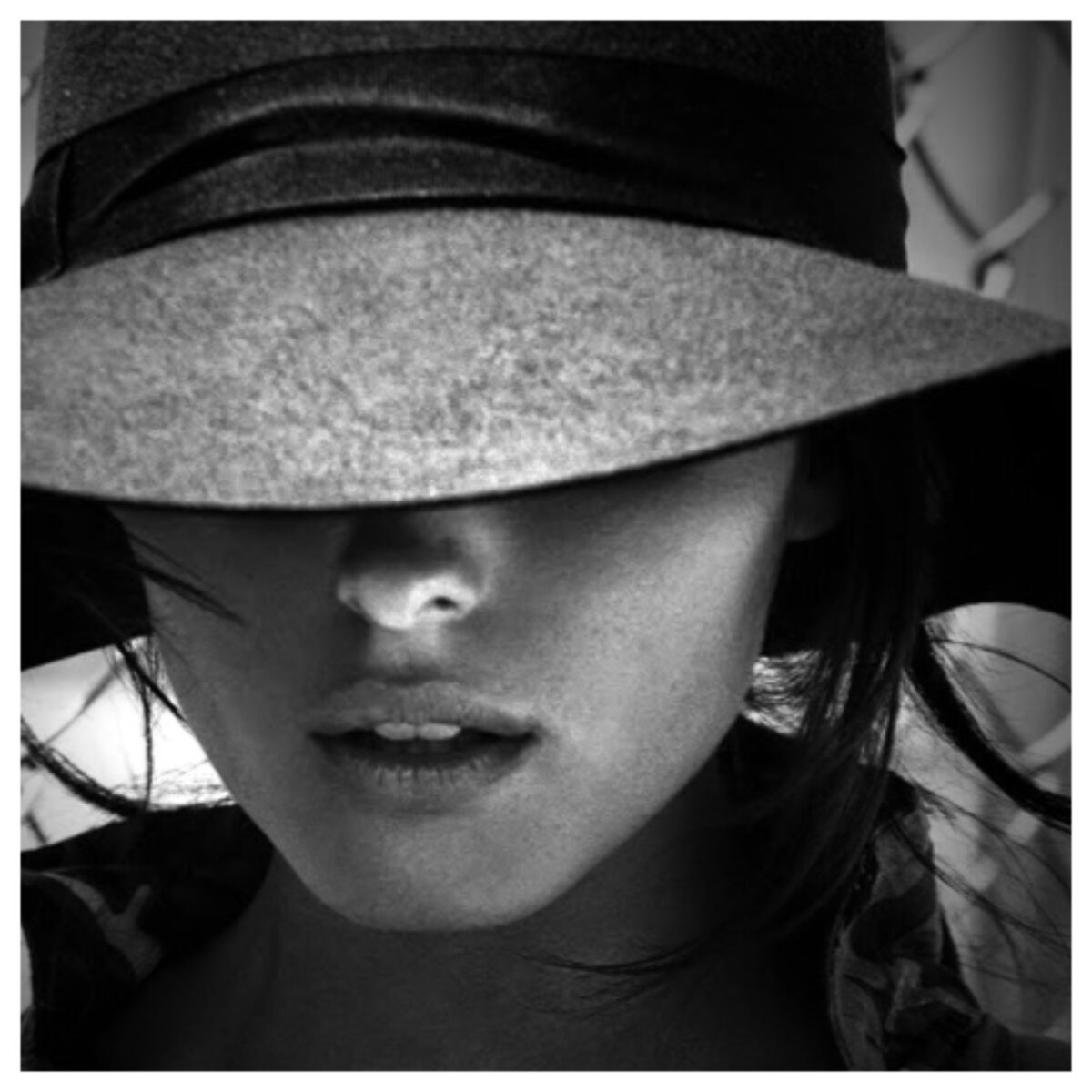 mystery woman with hat